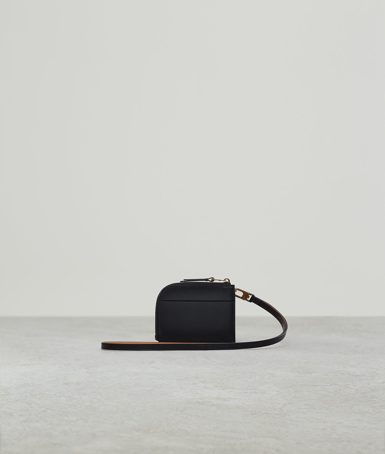 PERFORATED BUCKLE CARD HOLDER BLACK GINGER